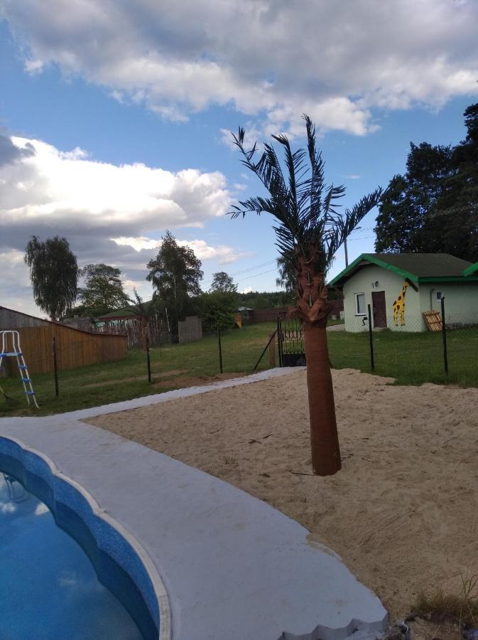 Domki Pod Lasem Плоньск Экстерьер фото